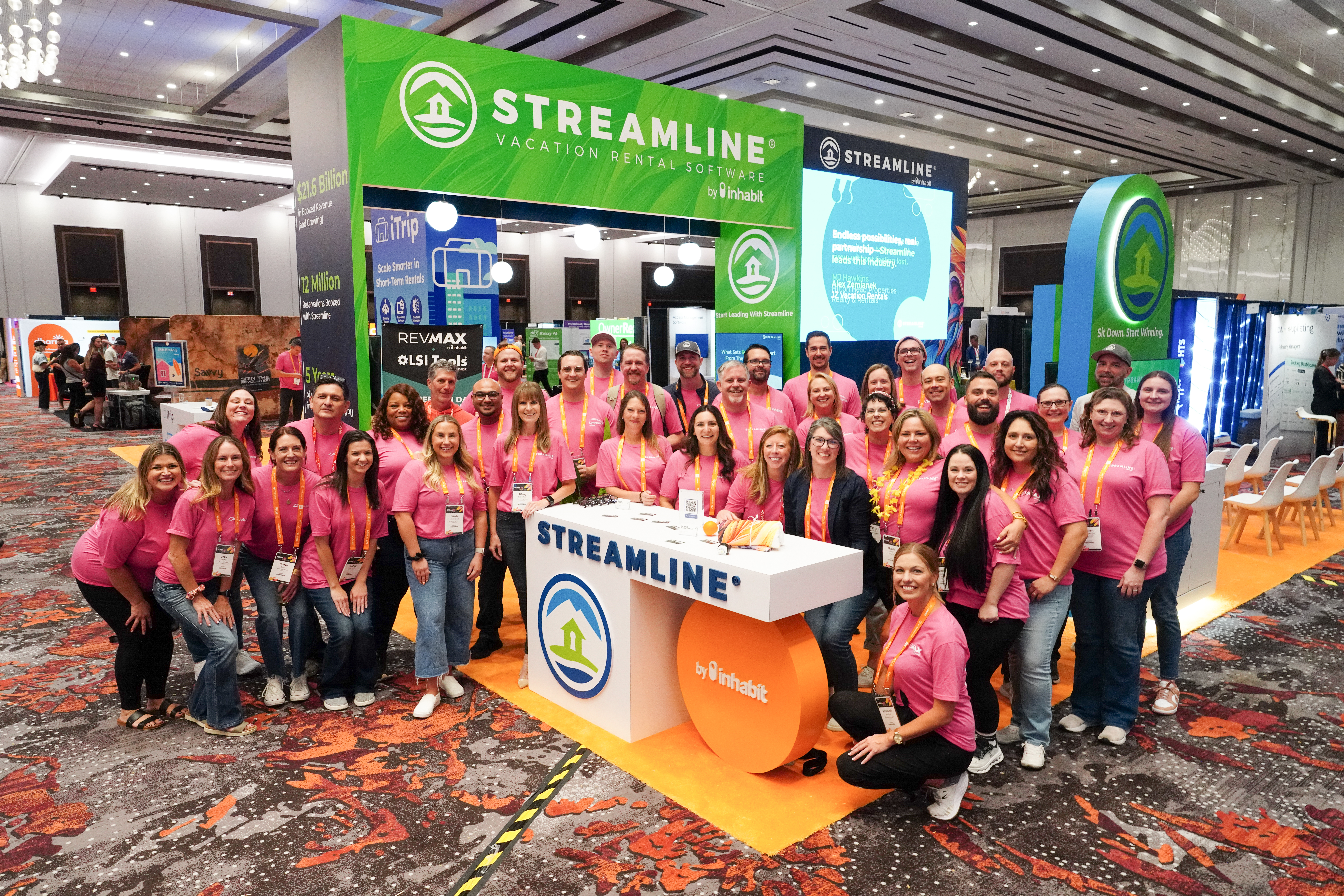 StreamTeam at VRMA Team members smiling at a booth